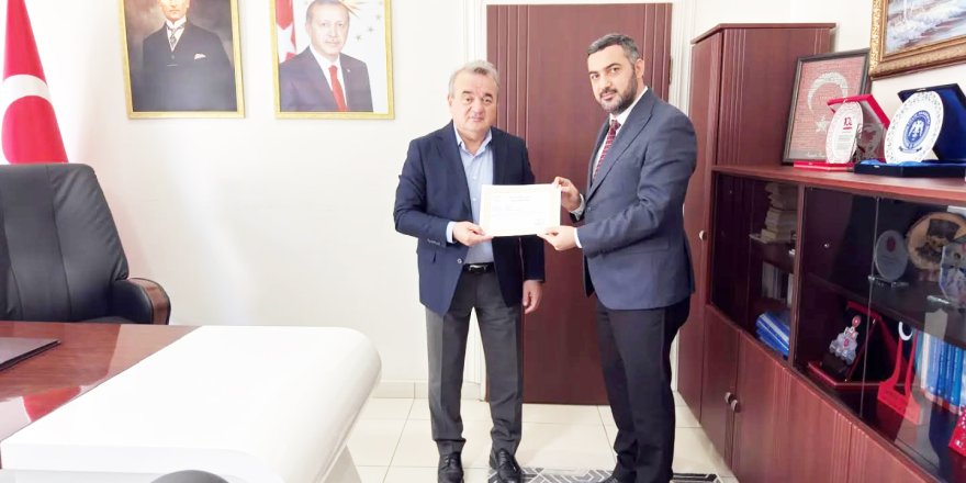 Kaymakam Öztürk'ten Müftü Arpacı'ya Başarı Belgesi