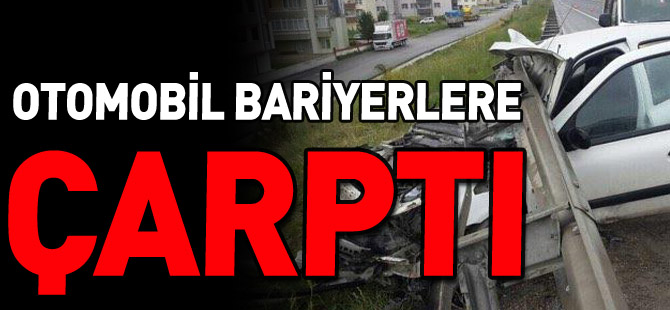 OTOMOBİL BARİYERLERE ÇARPTI 4 YARALI