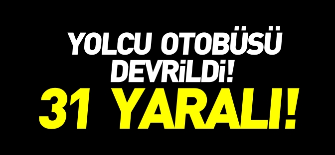 YOLCU OTOBÜSÜ DEVRİLDİ