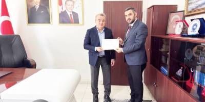 Kaymakam Öztürk'ten Müftü Arpacı'ya Başarı Belgesi