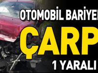 OTOMOBİL BARİYERLERE ÇARPTI