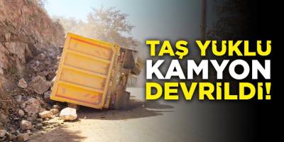 Taş yüklü kamyon devrildi