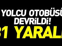 YOLCU OTOBÜSÜ DEVRİLDİ