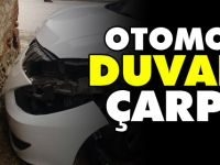 OTOMOBİL DUVARA ÇARPTI; 2 YARALI