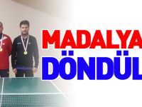 MADALYA İLE DÖNDÜLER