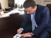 BAŞKAN BAKICI YENİ KİMLİK KARTI İÇİN BAŞVURU YAPTI